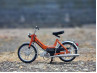 Schaalmodel Puch Maxi N 1:10 metallic oranje